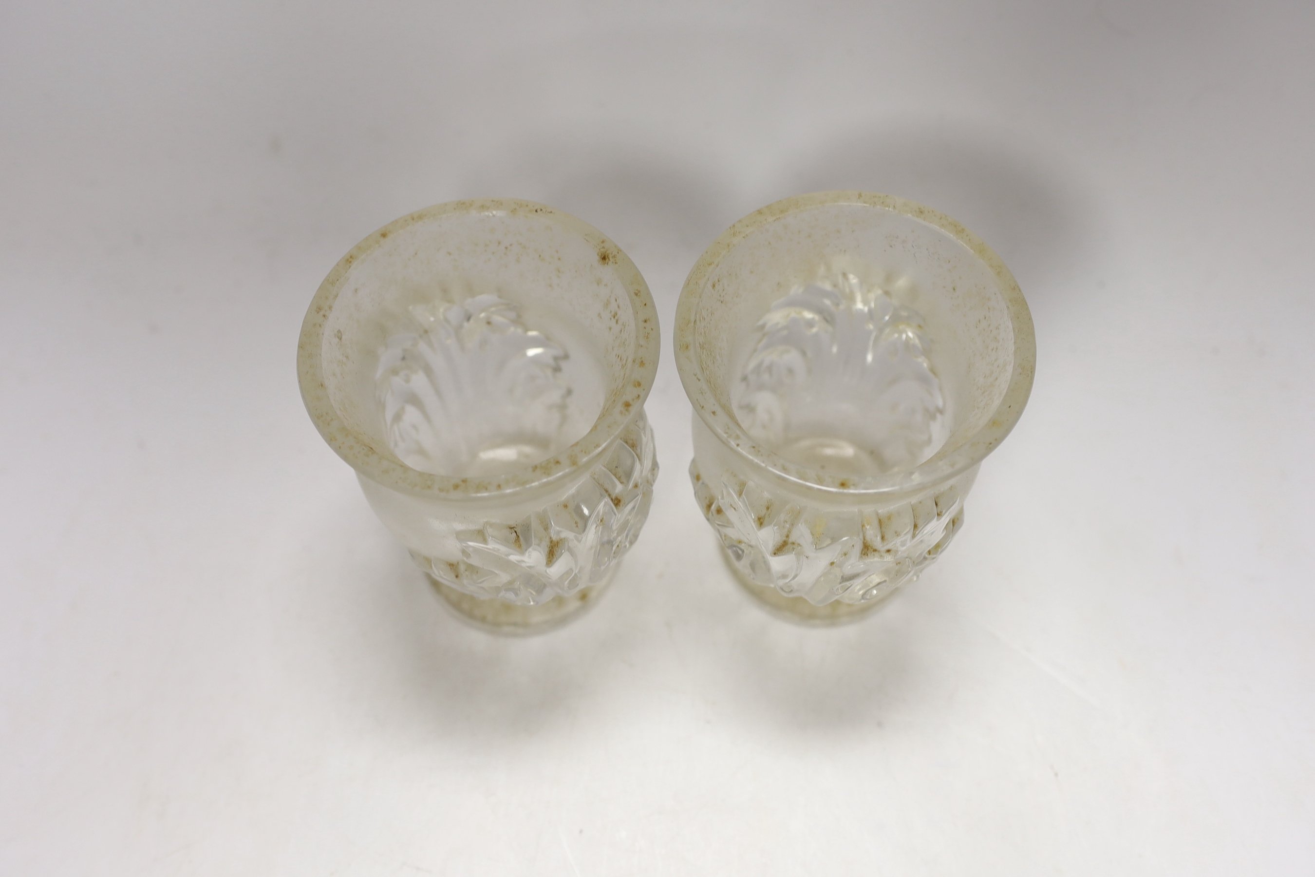 A pair of Lalique glass vases decorated in the St Cloud Acanthaceae pattern, etched mark, 12cm